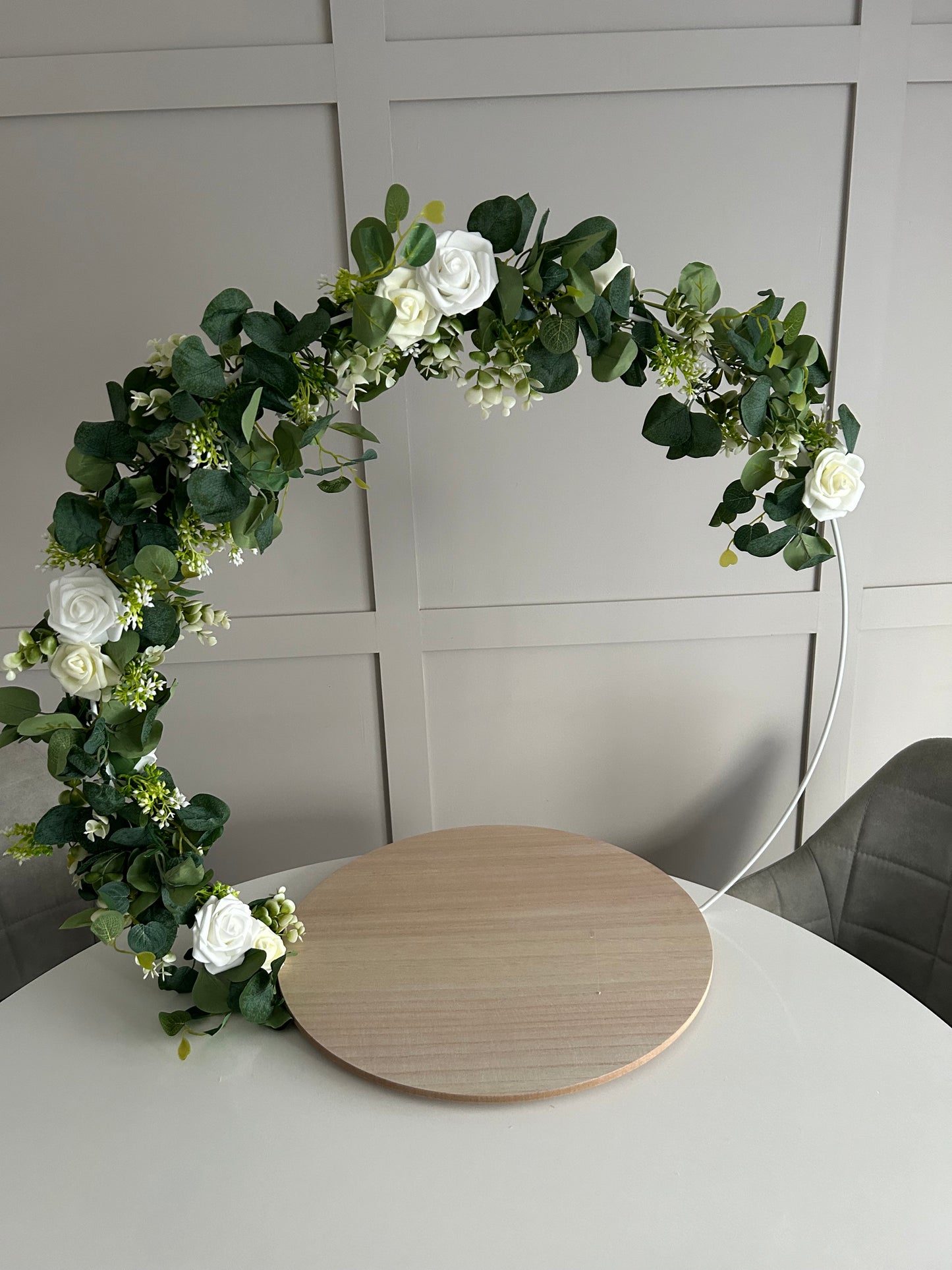 Rustic or light wood eucalyptus, Gypsophila and white and ivory roses Cake hoop and stand