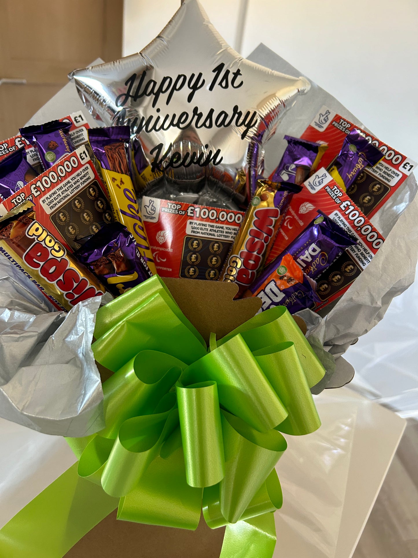 Personalised balloon scratchcards and Cadburys bouquet