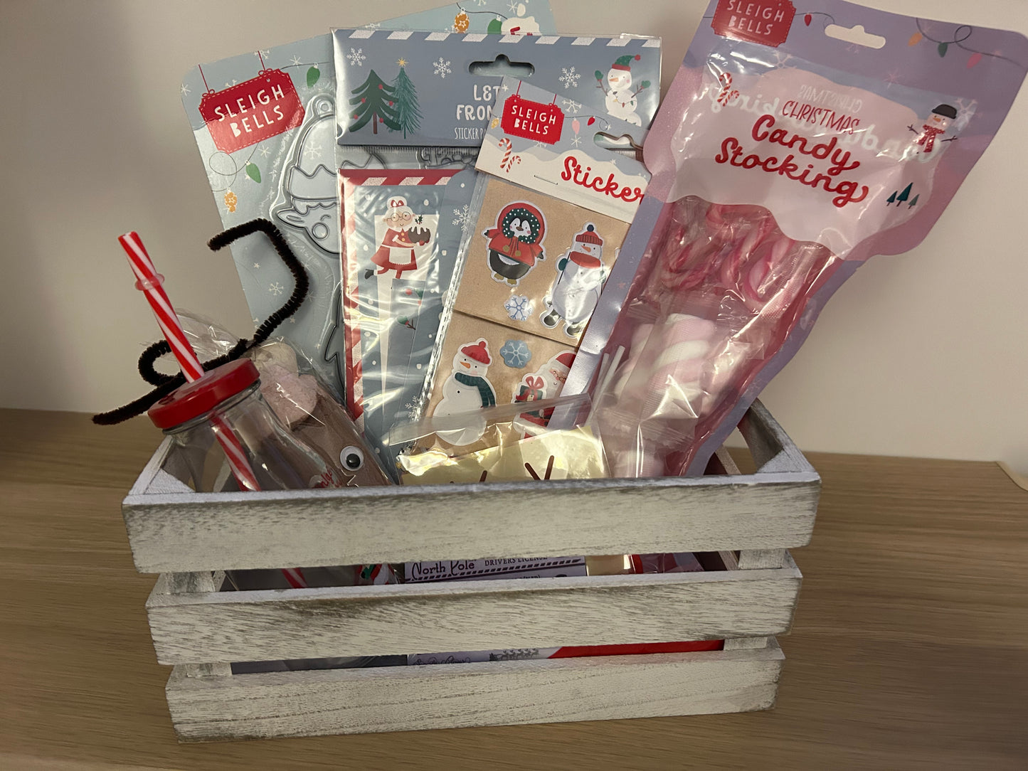 Christmas Eve crate filled with Christmas goodies and activities