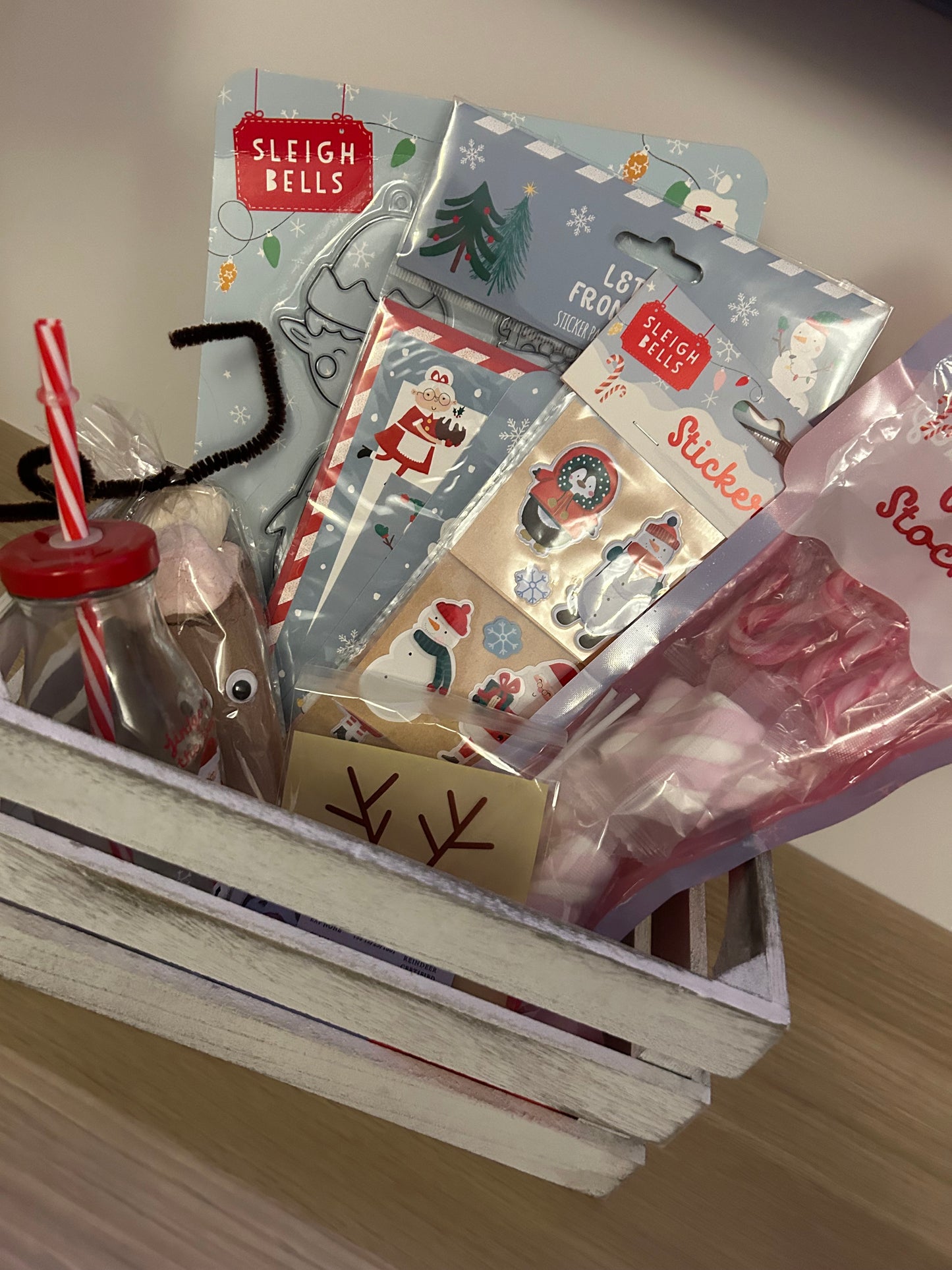 Christmas Eve crate filled with Christmas goodies and activities
