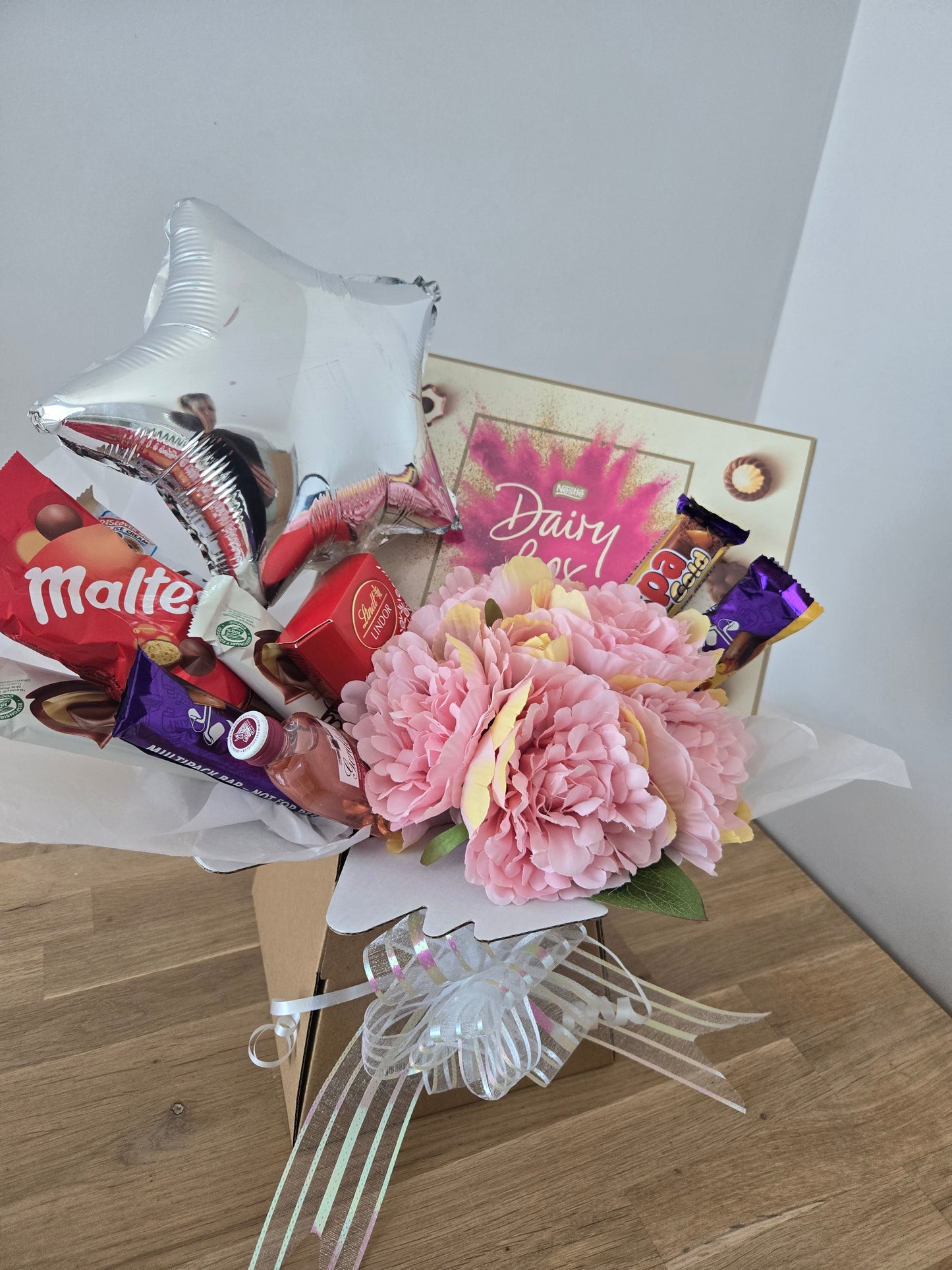 Beautiful mixed chocolate and flower bouquets