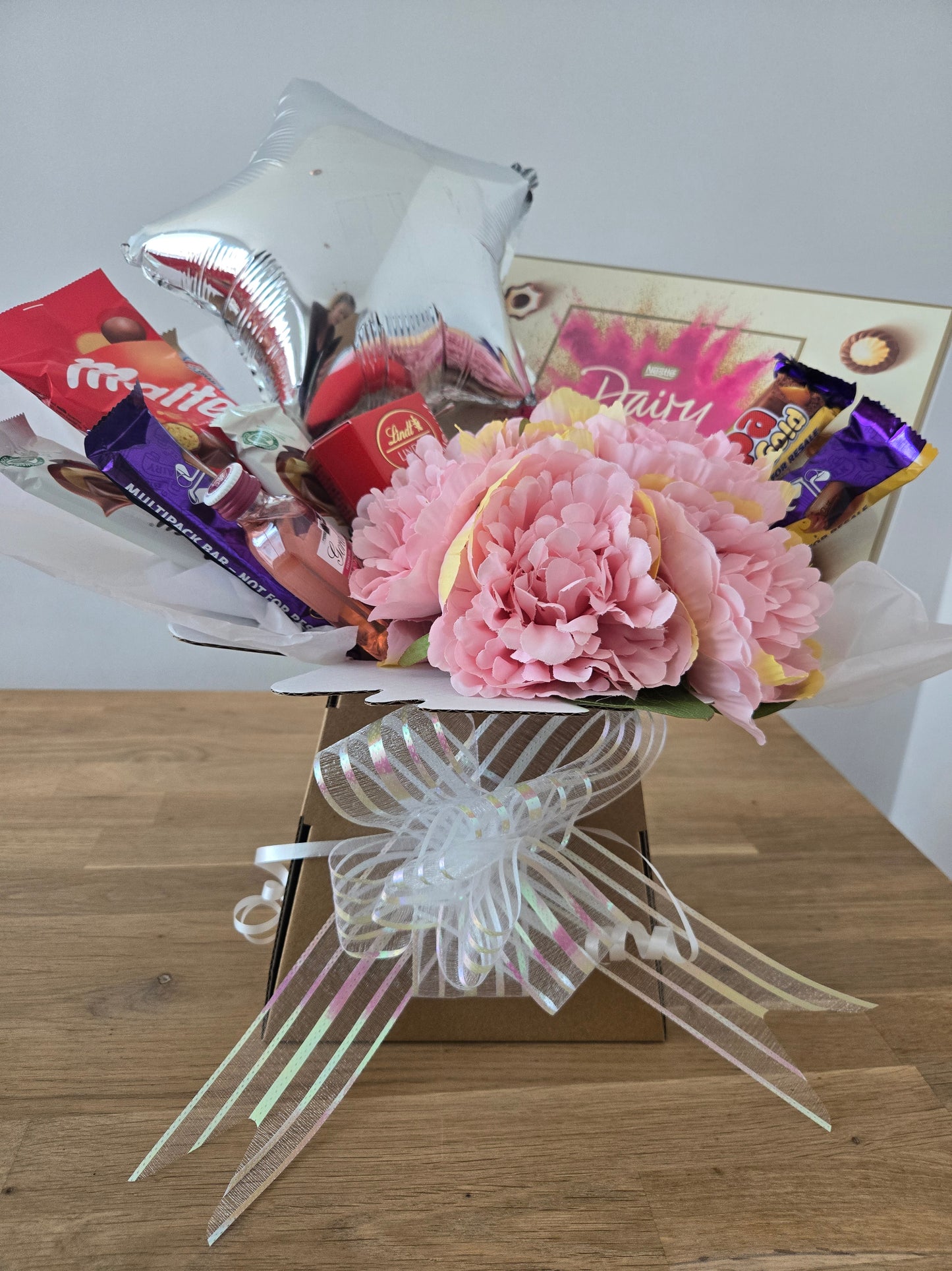 Beautiful mixed chocolate and flower bouquets