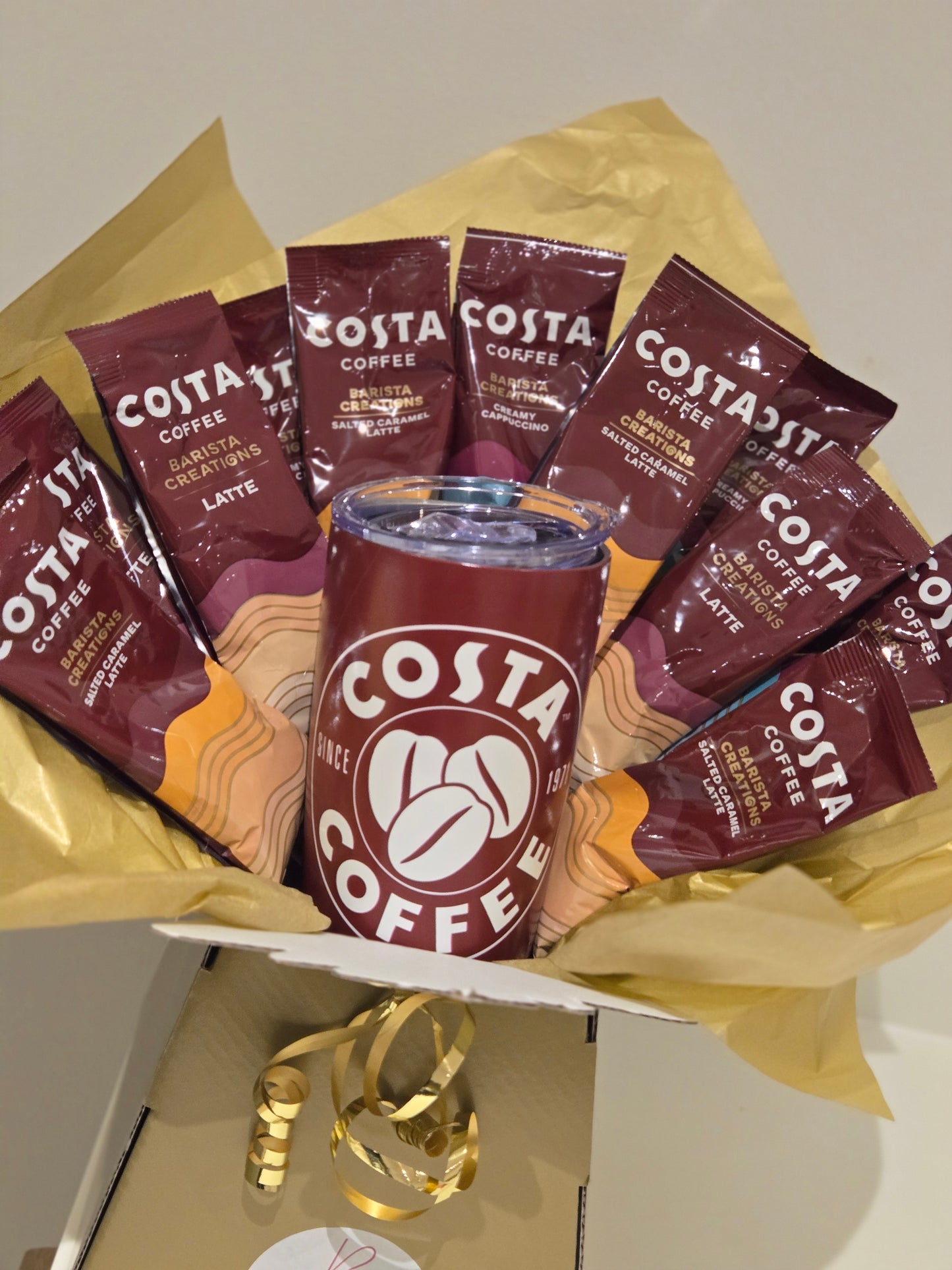 Costa coffee bouquet with coffee and travel cup
