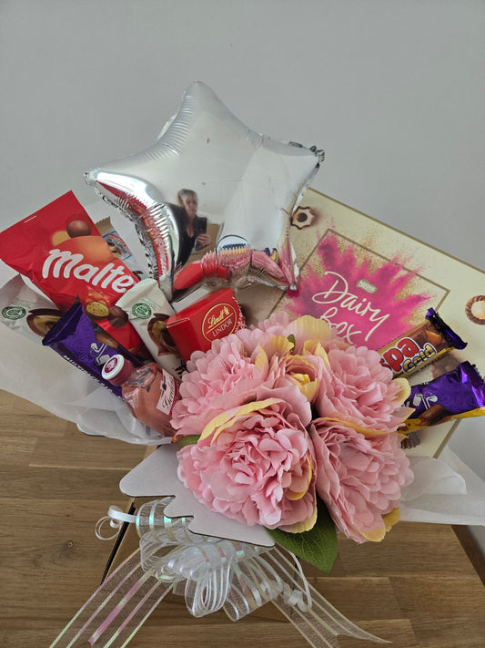 Beautiful mixed chocolate and flower bouquets