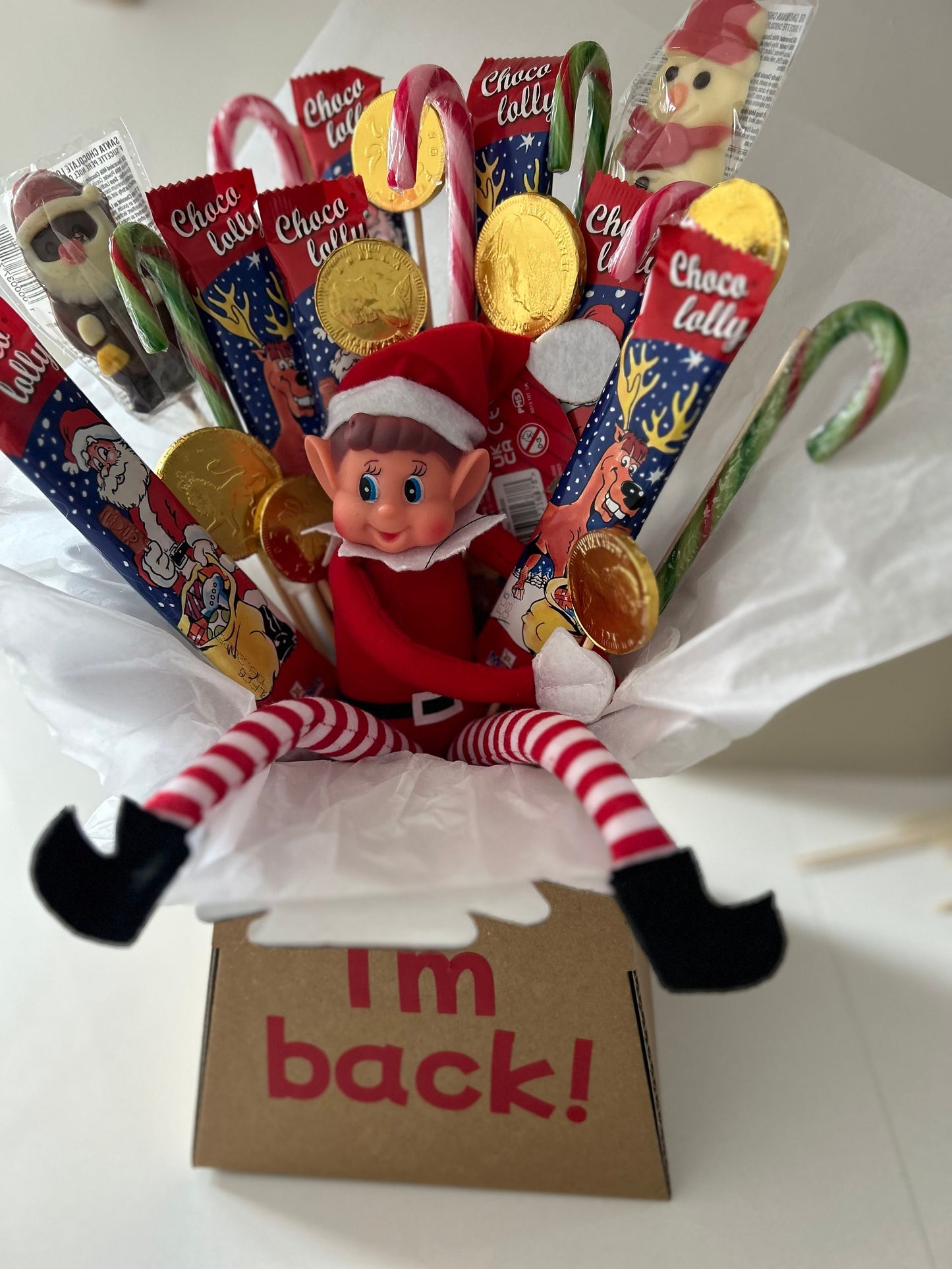 Elf bouquet with naughty elf and Christmas theme sweets and chocolates