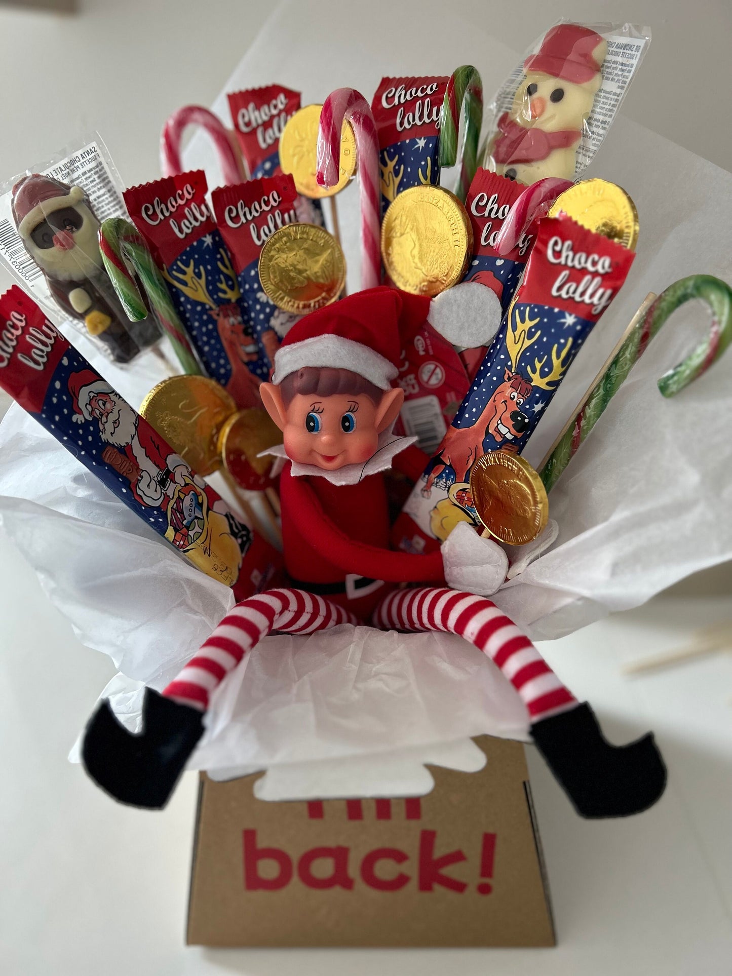 Elf bouquet with naughty elf and Christmas theme sweets and chocolates