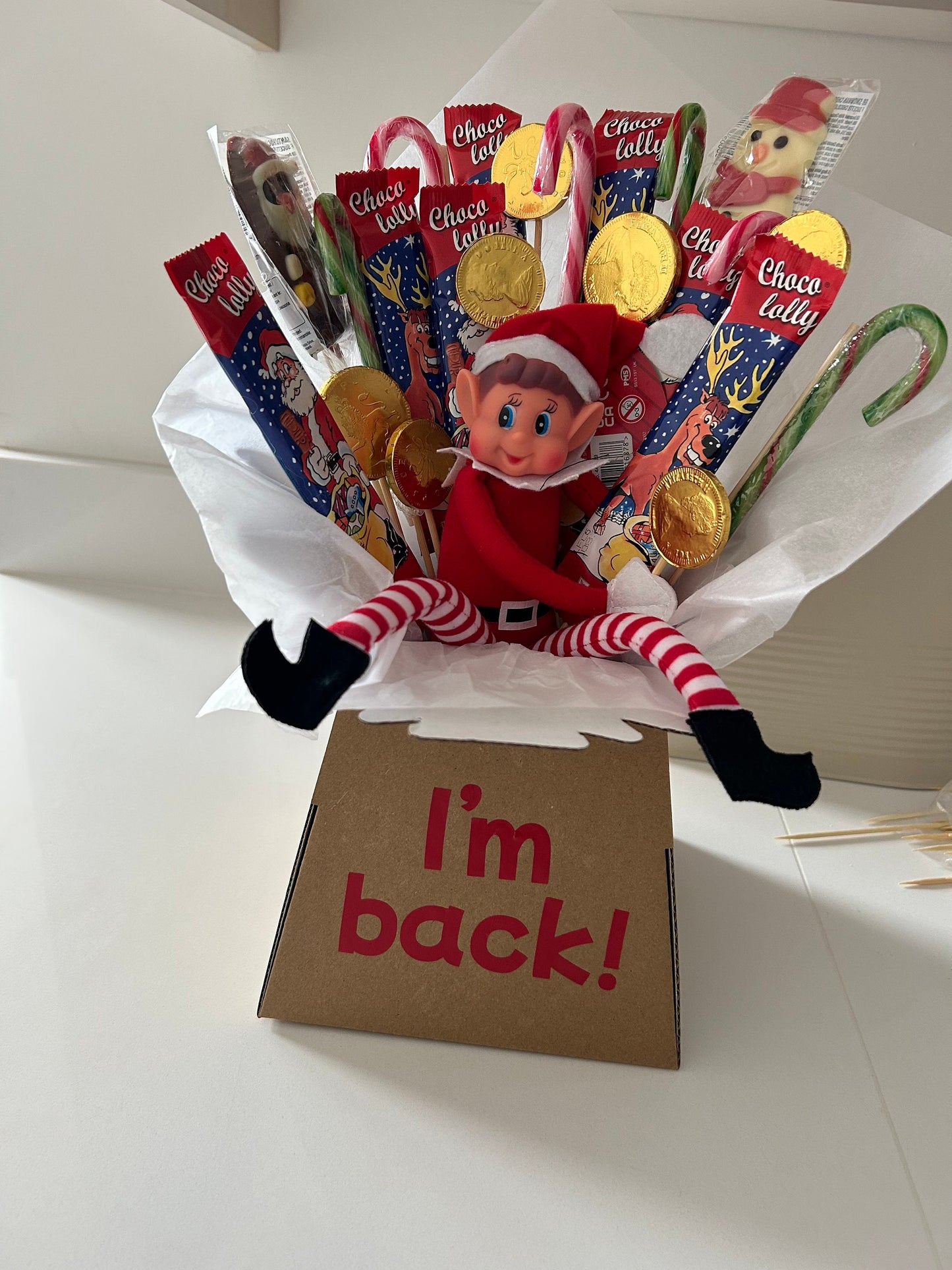 Elf bouquet with naughty elf and Christmas theme sweets and chocolates