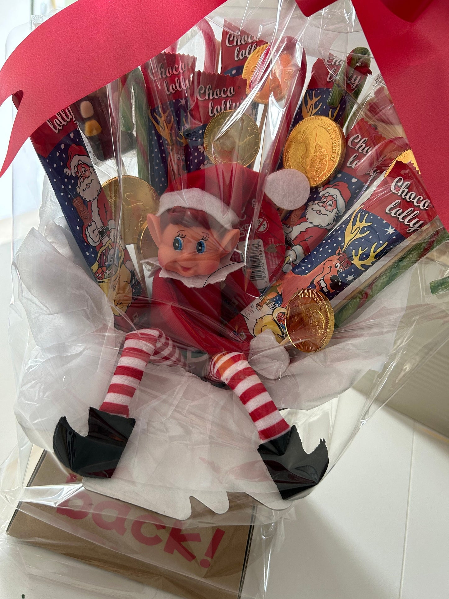 Elf bouquet with naughty elf and Christmas theme sweets and chocolates