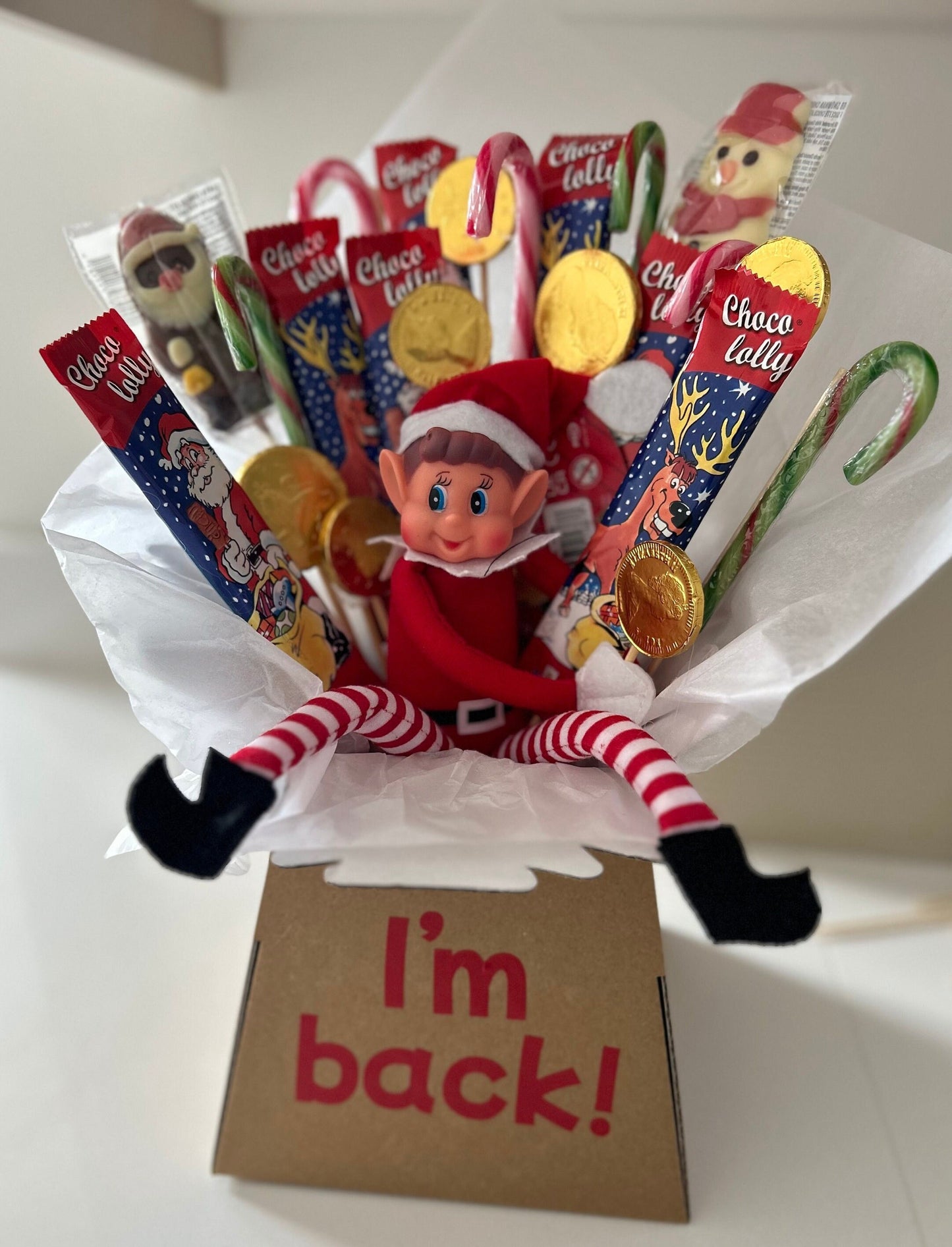 Elf bouquet with naughty elf and Christmas theme sweets and chocolates