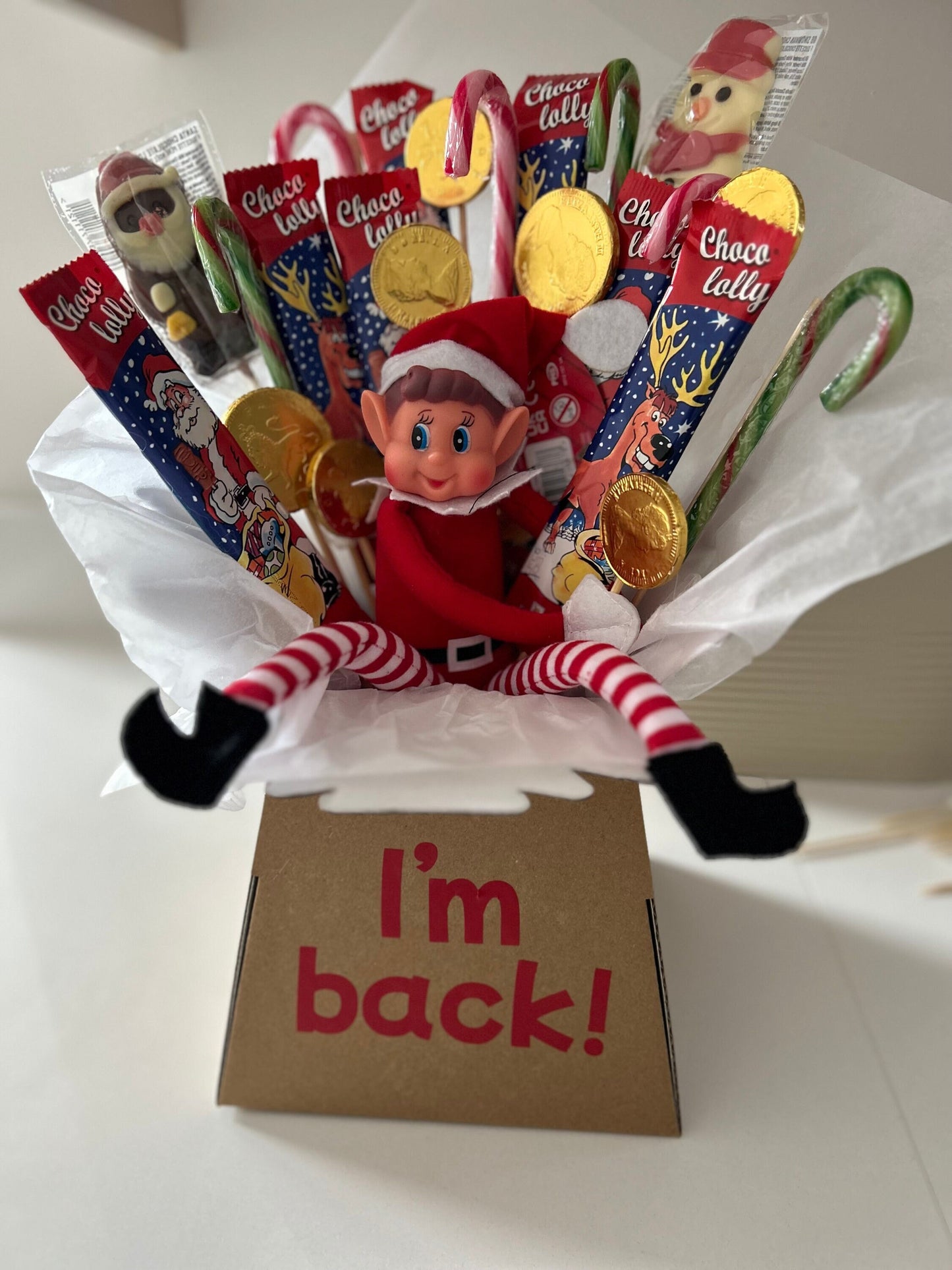 Elf bouquet with naughty elf and Christmas theme sweets and chocolates