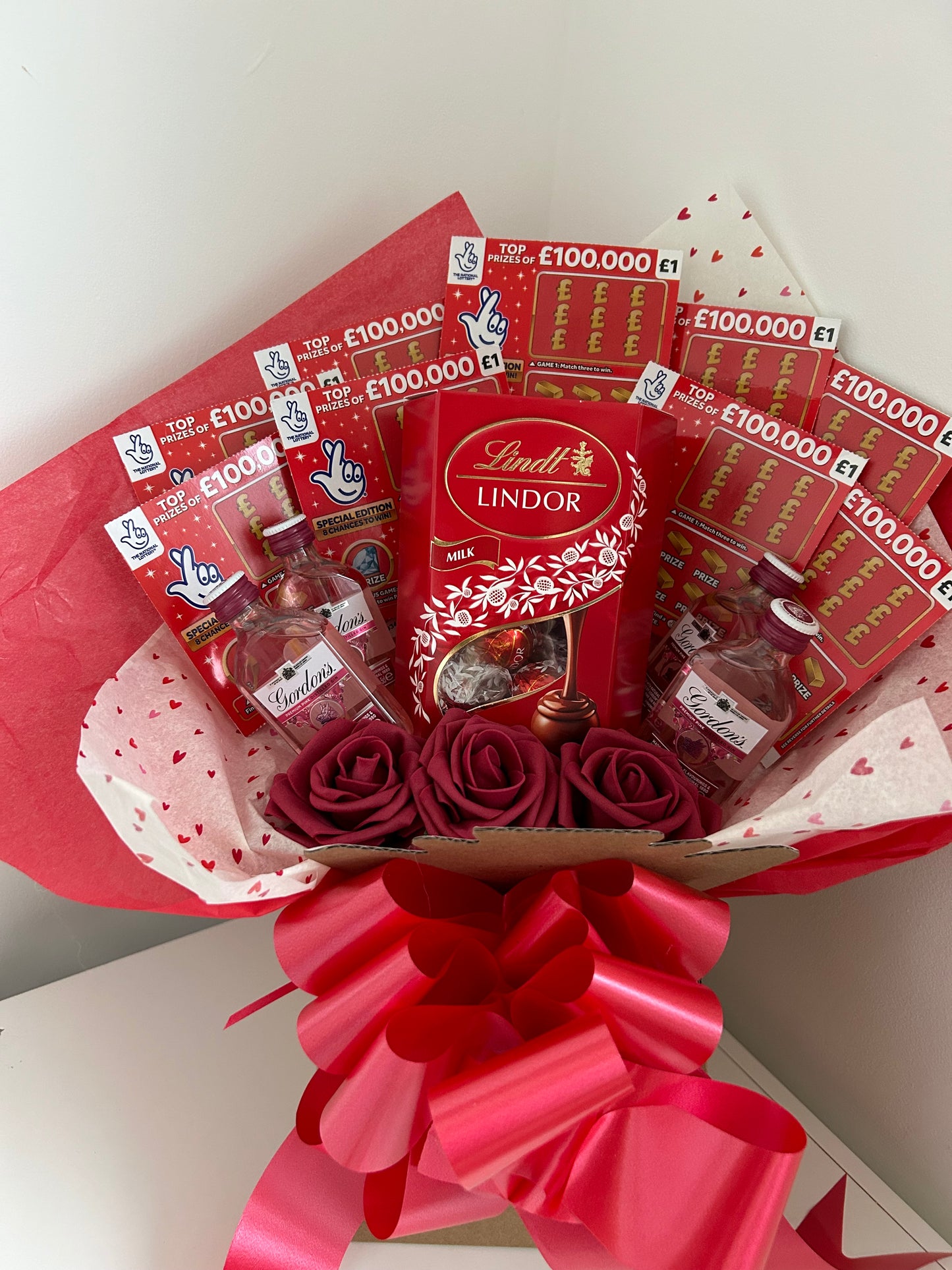 Gordon’s pink gin gift hamper lindt chocolates and scratchcards bouquet