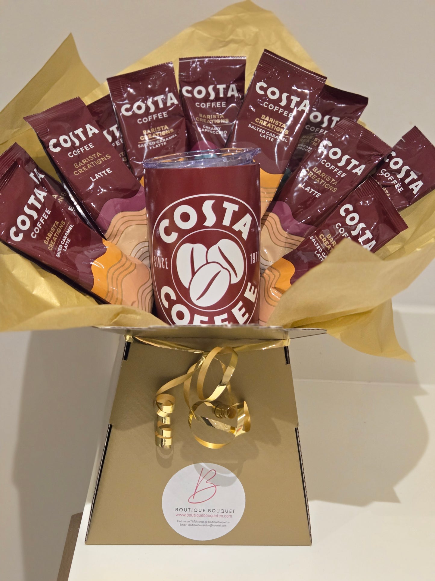 Costa coffee bouquet with coffee and travel cup