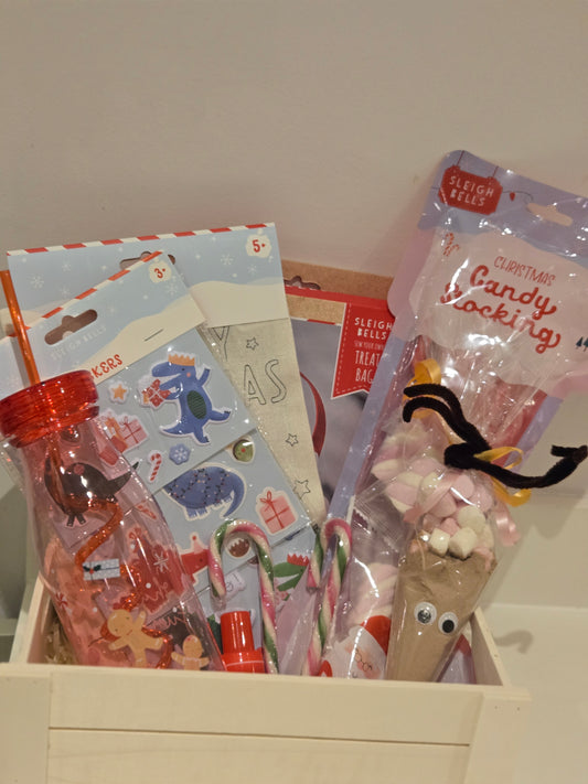Christmas Eve crate filled with Christmas goodies and activities